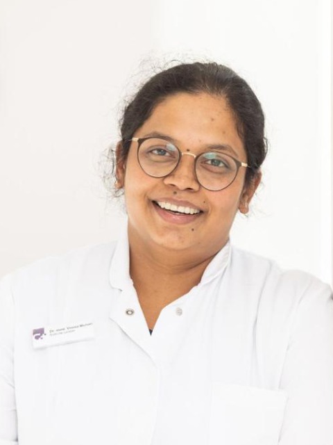 Dr. Veena